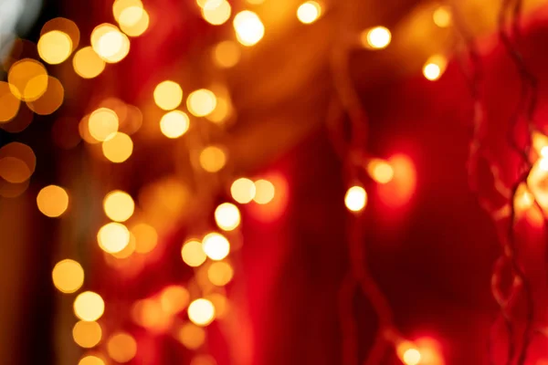 Bokeh Czerwony Niewyraźne Tło Światła Ozdoba Złote Wieńce Świętowania Nowego — Zdjęcie stockowe