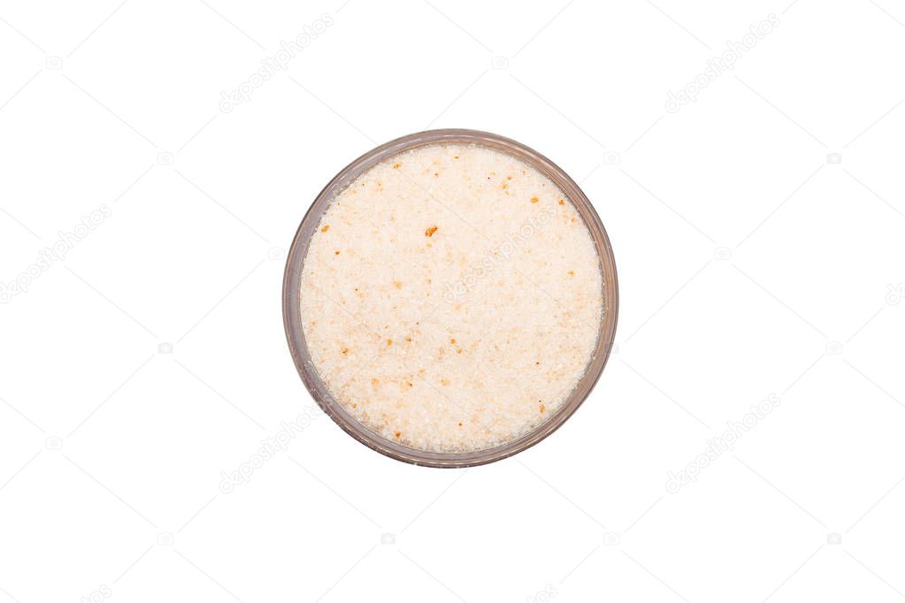 Himalayan salt in bowl, isolated, close up, macro, top view. Flavor food spice pinkish tint. Used for natural digestive aid, air purifier and sleep inducer