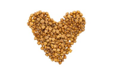 Karabuğday kabuğu çıkarılmış tane, kalp şeklinde, yakın çekim, izole. Ücretsiz Gluten ve alerjik olmayan sağlıklı bir diyet yemek. Geliştirilmiş kalp sağlığı ve Vejetaryen Protein kaynağı olarak kullanılan.