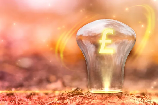 Pound sign concept with copy space. Currency symbol inside the light bulb. Exchange Rate changes.