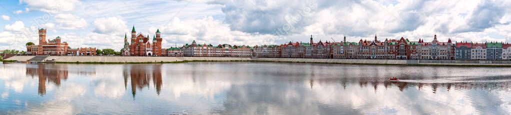 Panoramic view of facades of buildings with a medieval decoration in the Flemish style. Downtown of Yoshkar-Ola city, Russia. — Stock Image Panoramic View Facades Buildings Medieval Decoration Flemish Style Downtown Yoshkar Stock Photo