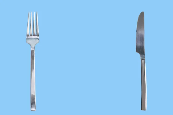 Silver Shiny Fork Knife Isolated Blue Background Concept Design Copy — Stock Photo, Image