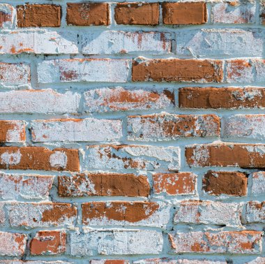 Kırmızı ve beyaz tuğla ile eski tuğla duvar. Avrupa çatı tasarım