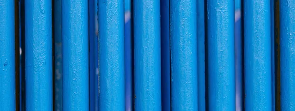 Many old blue pipes. Pipeline used in different industry ways: g