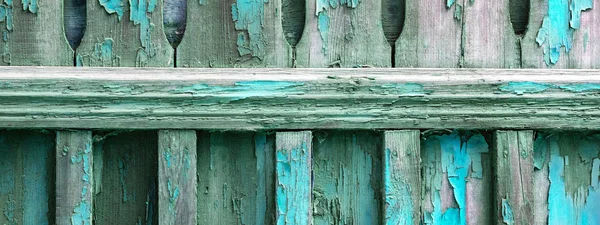Old wooden fence soiled with peeling blue turquoise paint. Abstr — Stock Photo, Image