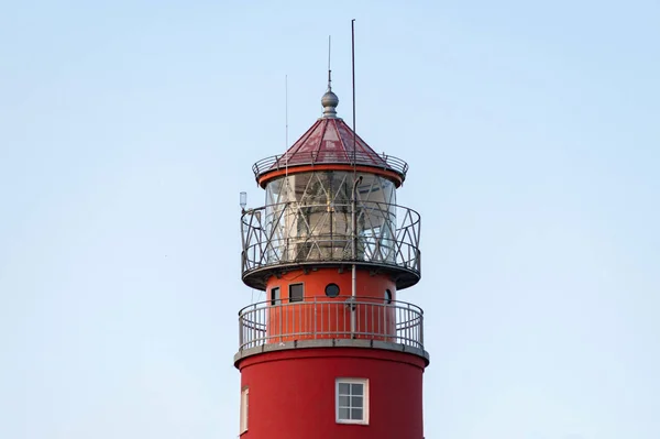 Lighthouse in seaport. Beautiful russian Baltiysk beacon. Scenery blue sky, copy space. — Stock Photo, Image