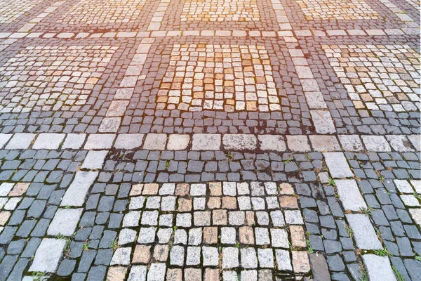 Old paving stones pattern. Texture of ancient german cobblestone in city downtown. Little granite tiles. Antique gray pavements. — Stock Photo, Image