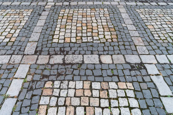 Текстура плитки. Візерунок античної німецької бруківкою в центрі міста. Невеликі гранітні тротуарні камені. Античний сірий тротуари. — стокове фото