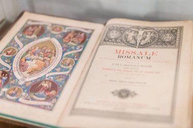Kaliningrad, Russia - 06.16.2019 - Roman Missal book in cathedral. Liturgical book for celebration of Mass in Roman Rite of Catholic Church clipart