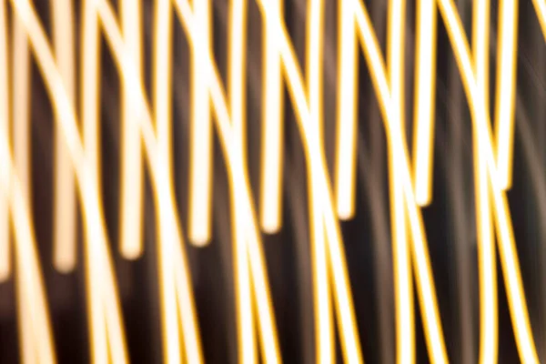 Abstracte Licht Achtergrond Geel Vervaagde Lichten Stroken Bokeh Prachtig Bewegingsschilderij — Stockfoto