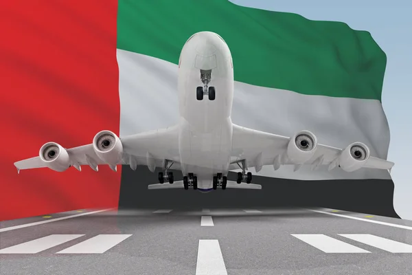 Avión despegando contra la bandera Emiratos Árabes Unidos — Foto de Stock