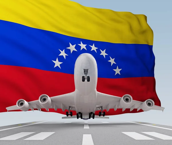 Flugzeug hebt vor venezuela-Flagge ab — Stockfoto