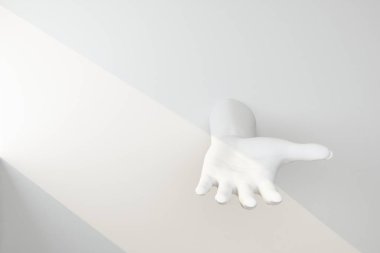 beyaz el duvardan uzatılmış