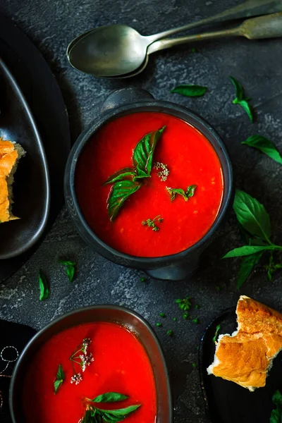 Roasted pepper and tomato soup vegan..style rustic.selective focus