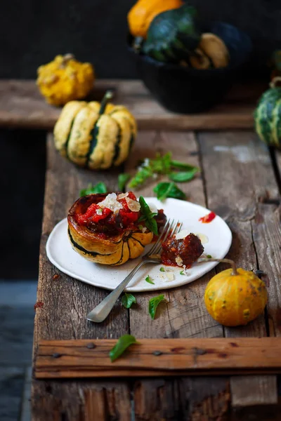 Meatball-stuffed squash with tomato  sauce. rustic style.selective focus