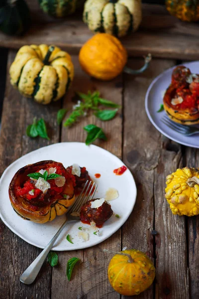 Meatball-stuffed squash with tomato  sauce. rustic style.selective focus