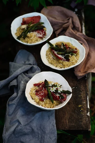 Quinoa risotto with asparagus..style rustic. — Stock Photo, Image