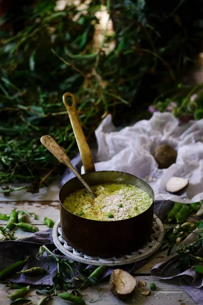 Polenta with green peas.selective focus — Stock Photo, Image