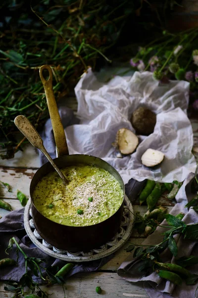 Polenta with green peas.selective focus — Stock Photo, Image