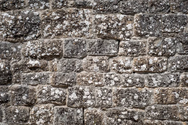 バック グラウンドの石造りの壁テクスチャです 旧式な建物の詳細 — ストック写真