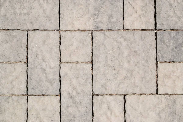 stone road. the texture of the stones. stone background. the design of the laying of cobblestones