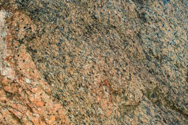 Kırmızı granit kaya arka plan doku yakın çekim