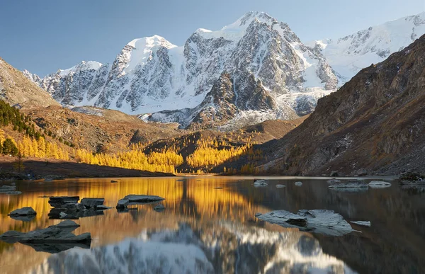 Bright colorful yellow autumn mountain lake, Russia, Siberia, Altai mountains, Chuya ridge.