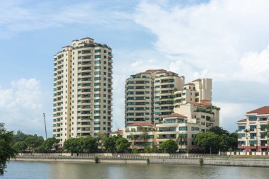 Singapore  - June 18, 2018: Condominiums by the river  with lots of balconys clipart