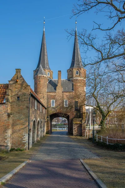 View on the Eastern Gate, an old city gate of Delft, the Netherlands. This gate build around 1400 is the only remaining city gate of Delft.