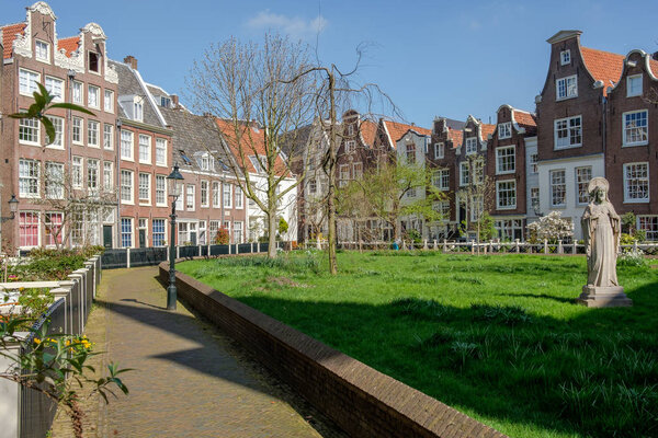 A view in a medieval inner court, the Begijnhof, Amsterdam, Netherlands