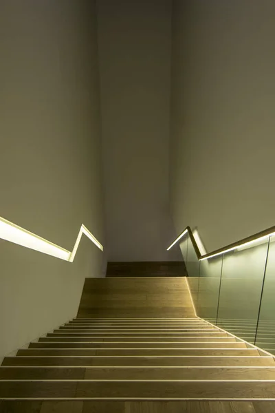 Staircase with handrails and lights