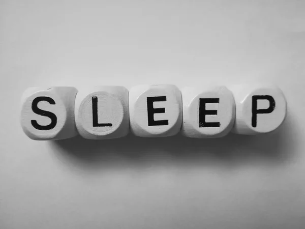 Слово Sleep Spelled Dice — стоковое фото