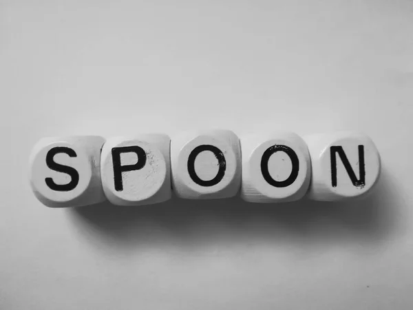 zar üzerinde yazıldığından kelime kaşık