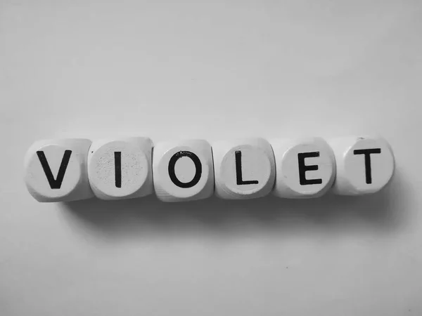 Violettes Wort Auf Weißen Würfeln — Stockfoto