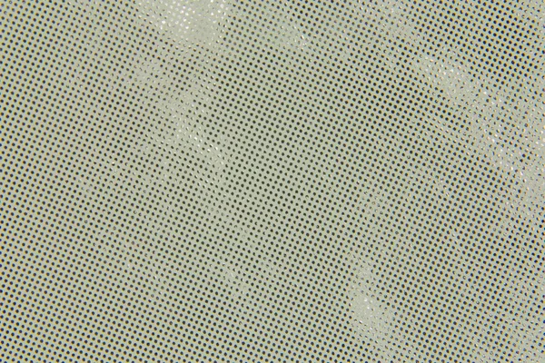Gray texture with dots.