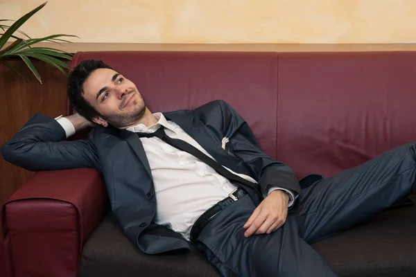 Tired Young Businessman Relaxing Sofa — Stock fotografie