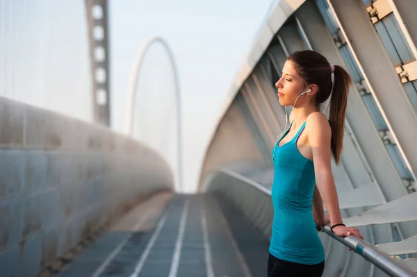 Young Woman Outdoors Modern Bridge While Listening Music — ストック写真