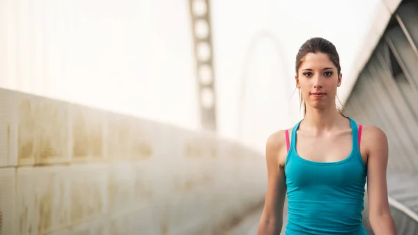 Young Woman Running Outdoors Modern Bridge Workout Wellness Concept — ストック写真