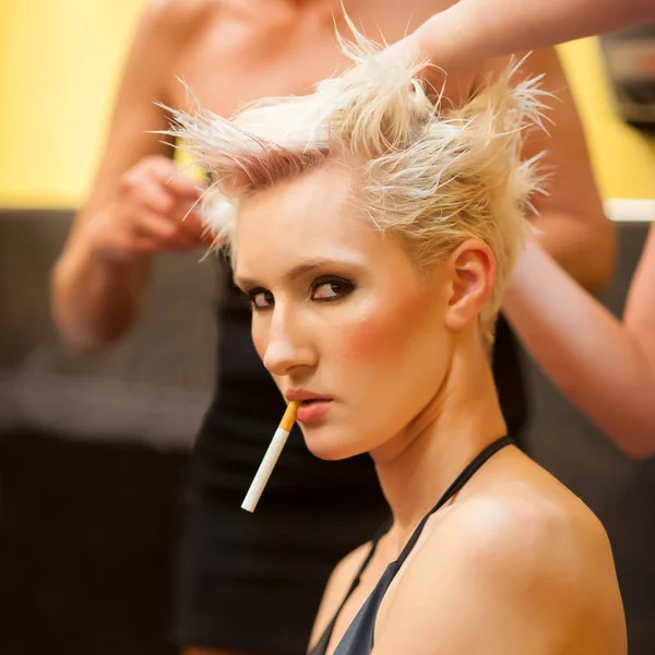 Sexy Woman Smoking Cigarette While Making Hair Style — Stock Photo, Image