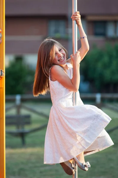 Young girl portrait on playground. — Stok fotoğraf