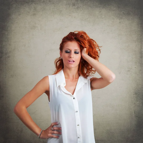 Worried Redhead Woman Portrait Grunge Background — Stock Photo, Image