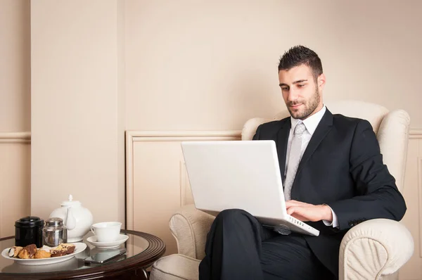 Young Businessman Working Portapble Computer Sit Armchair Luxury Hotel — Stock Photo, Image