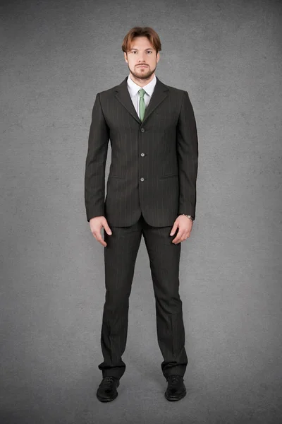 Young Businessman Full Body Front Portrait Grunge Background — Stockfoto