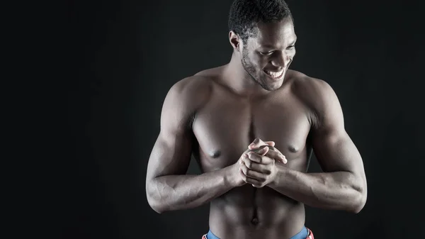 Confident young smiling man shirtless portrait against black bac — Stock Photo, Image