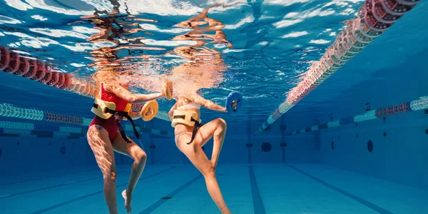 Couple Women Wearing Red Swimsuit Doing Fitness Excercises Swimming Pool — Stock Photo, Image