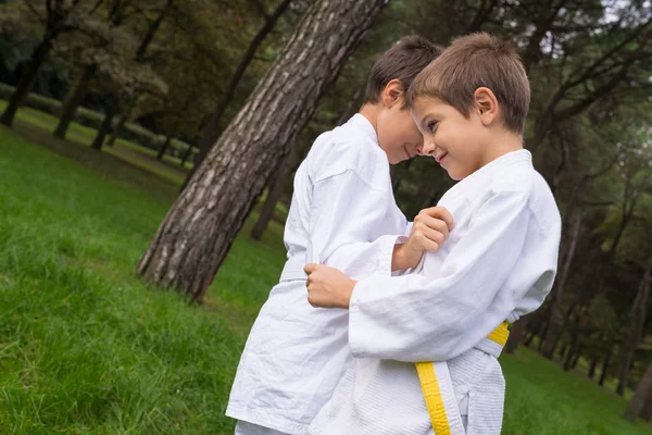 Two Kids Practicing Judo Outdoors Park — Stock Photo, Image