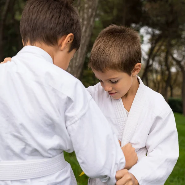 Two Kids Practicing Judo Outdoors Park — Stock Photo, Image