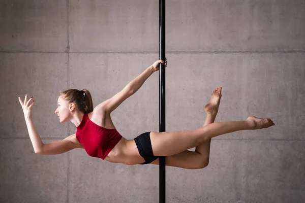 Beautiful Woman Performing Pole Dance Shot Industrial Concrete Background — Stock Photo, Image