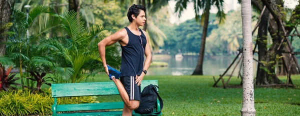 Panoramic Image Fitness Man Stretching Running Bench Park — Stock Photo, Image