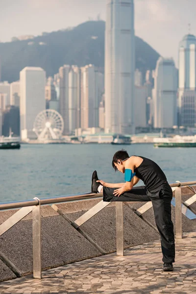 Fitness Man Doing Stretching Hong Kong Promenade Filtered Image —  Fotos de Stock